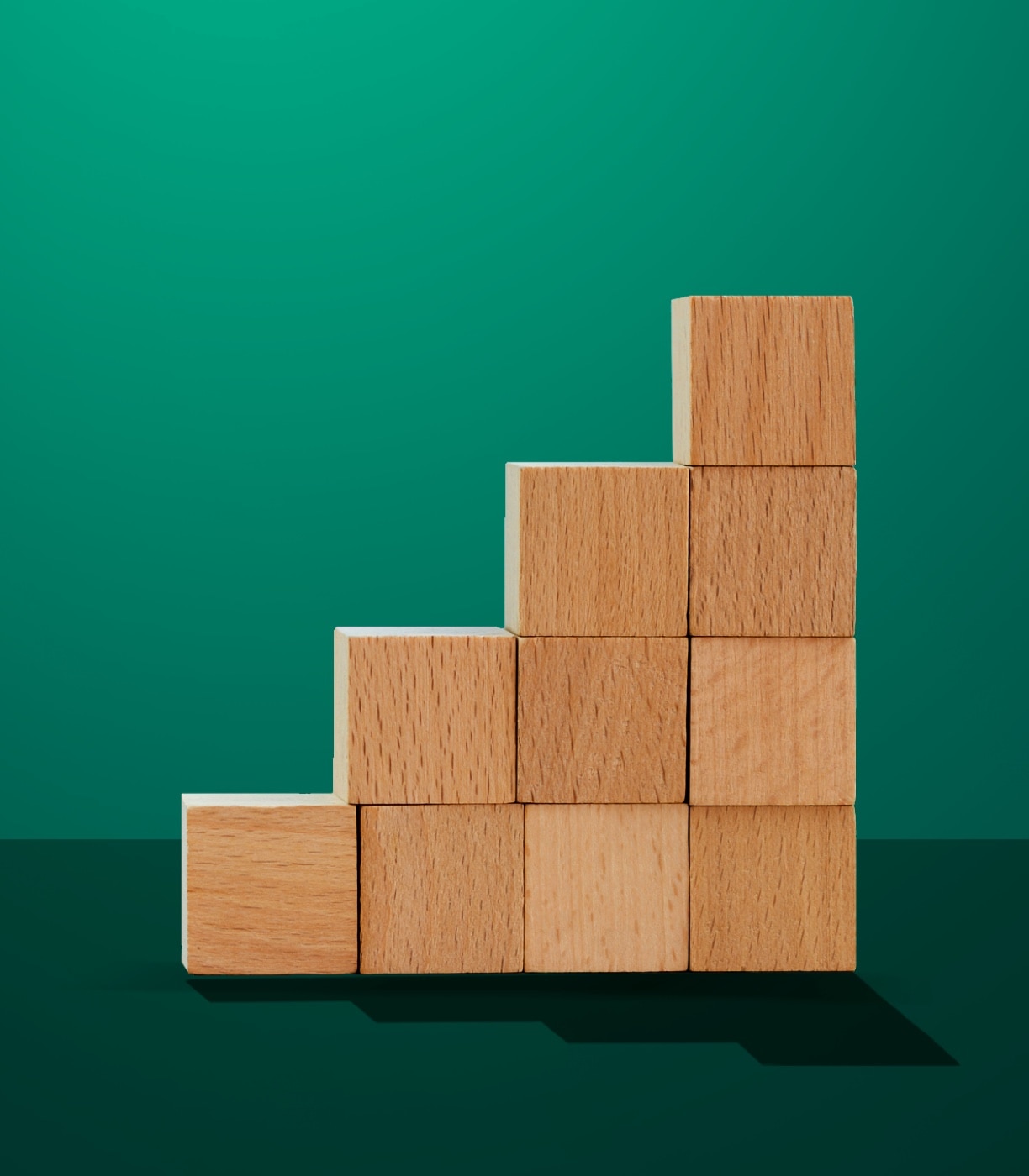 Wooden blocks arranged in a staircase pattern.