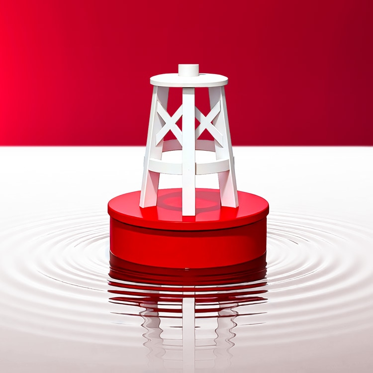 A white buoy-like structure with crisscross supports sits on top of a red circular base floating in calm water, creating gentle ripples and a reflection below, against a bold red-and-white background.