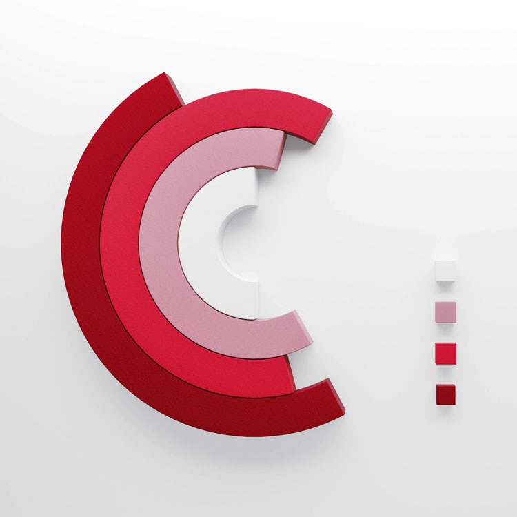Four nested semi-circular blocks in shades of red and pink arranged in a C-shape on a white background, with four matching color swatches aligned vertically to the right. The semi-circular blocks resemble a graphical chart, while the swatches suggest a legend.