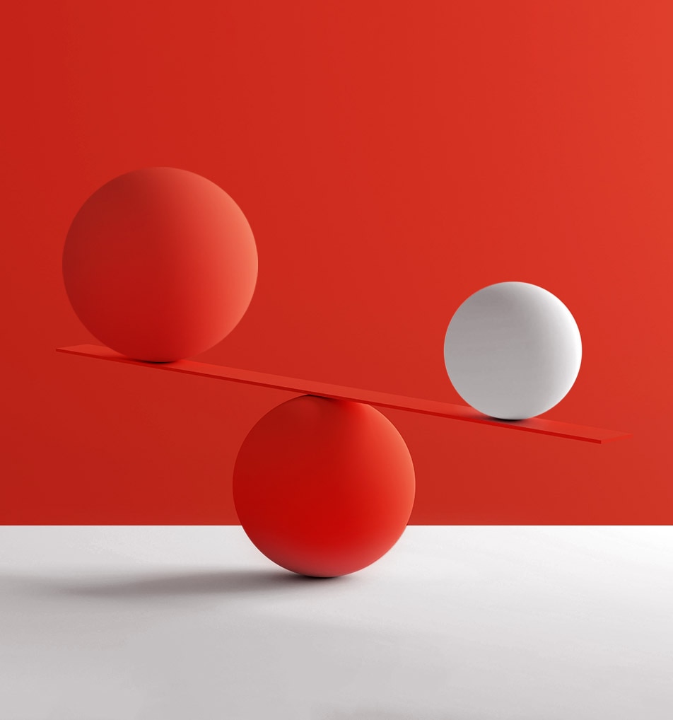 red and white spheres on scale