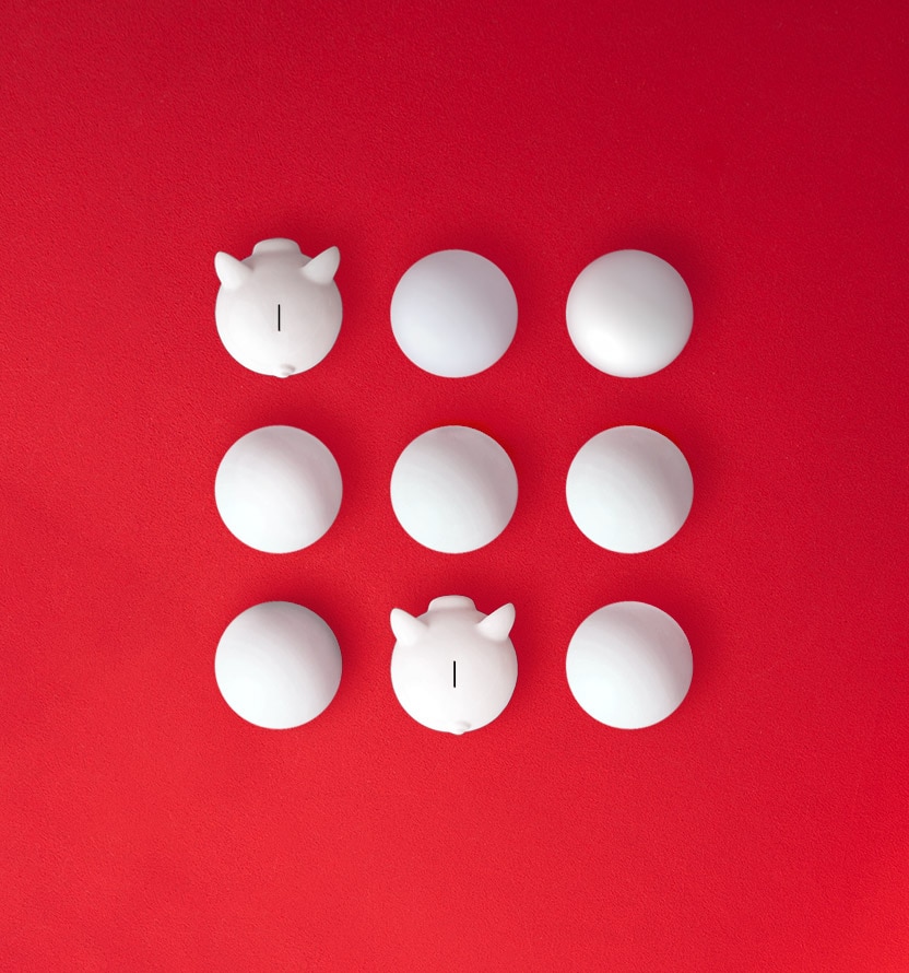 illustration of white spheres and piggy banks