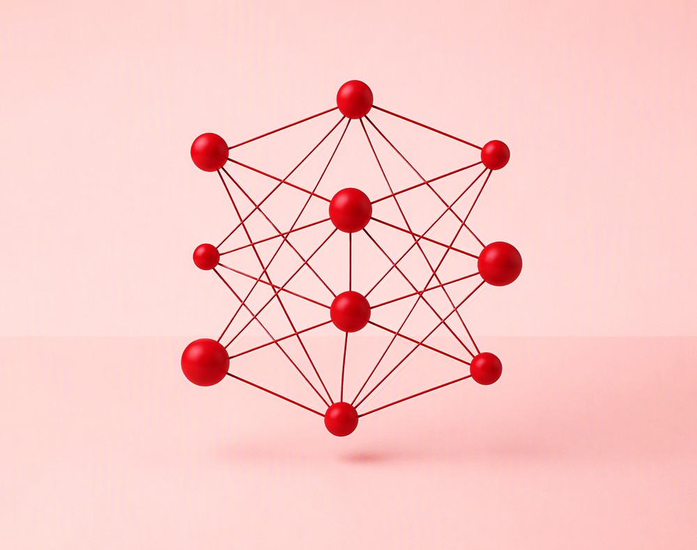 Abstract neural network graphic composed of interconnected red spheres and lines on a light pink background.