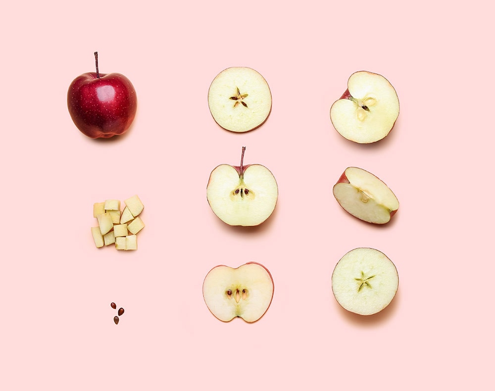 apple in various stages of slicing