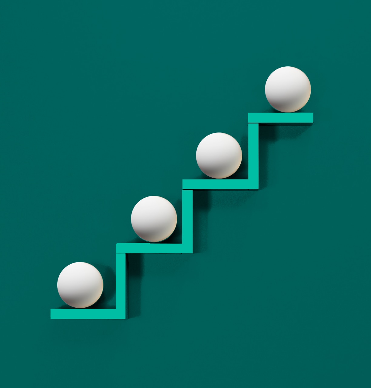 Illustration showing balls arranged on a set of ascending stairs. 