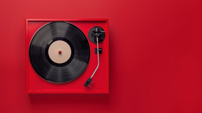image of record player on red background