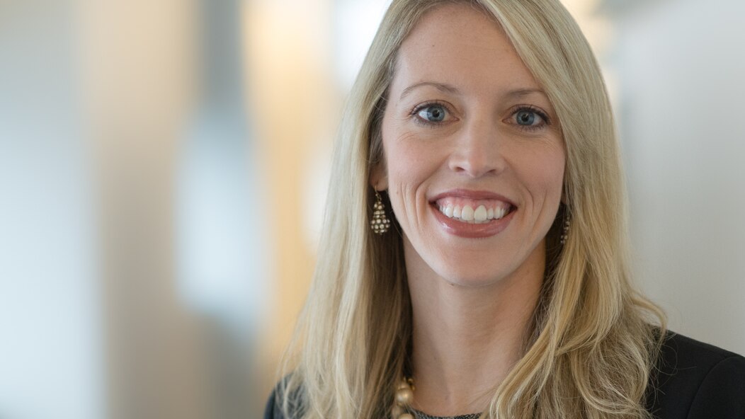 The photo shows Lauren Valente, managing director of Vanguard’s Human Resources division.